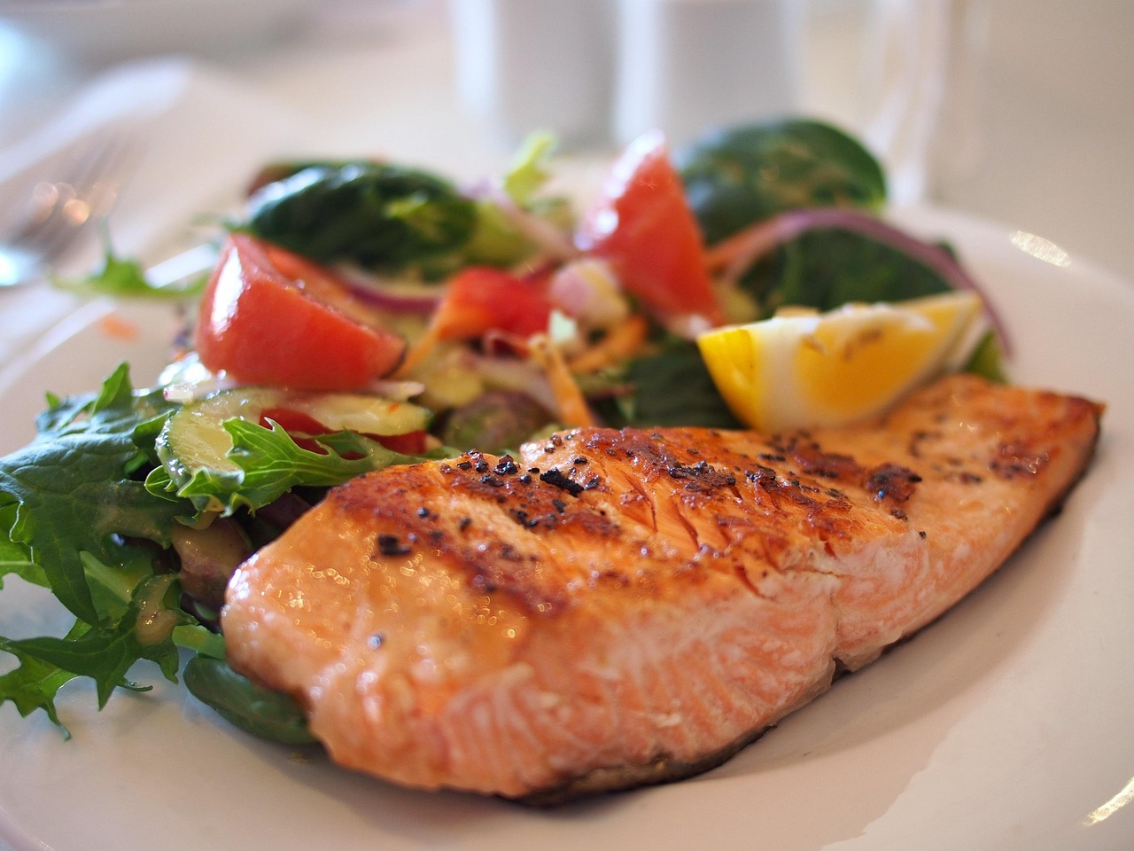 High-protein salmon meal with vegetables for low-carb eating