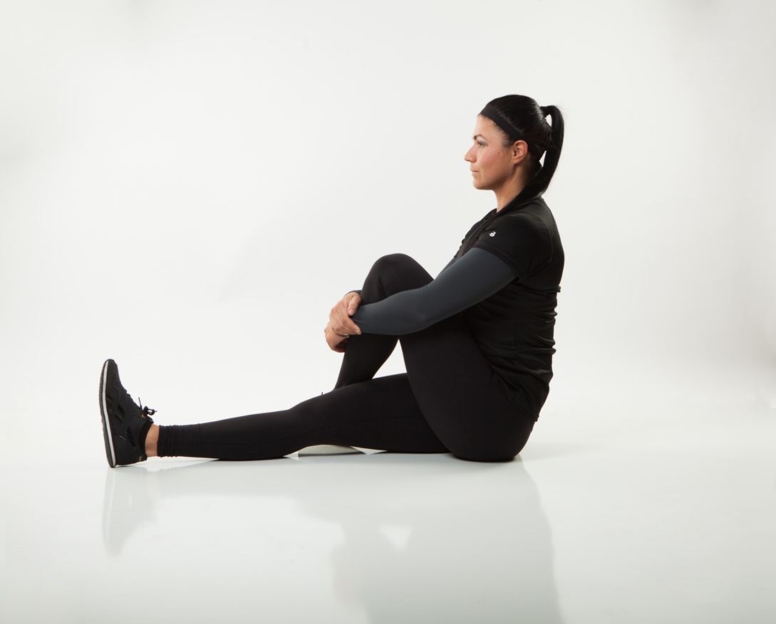 This seated glute stretch from Personal Trainer Food can help reduce hip pain and sciatica.
