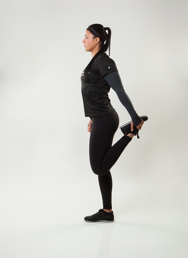A standing quad stretch will help stretch your hip flexors which can shorten and cause back pain.