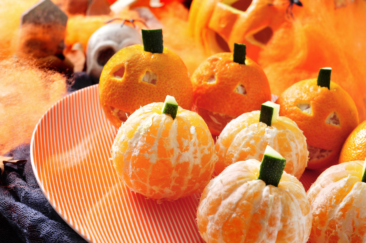 Peel some tangerines and stick a little zucchini stem in the top for a festive and healthy Halloween treat.