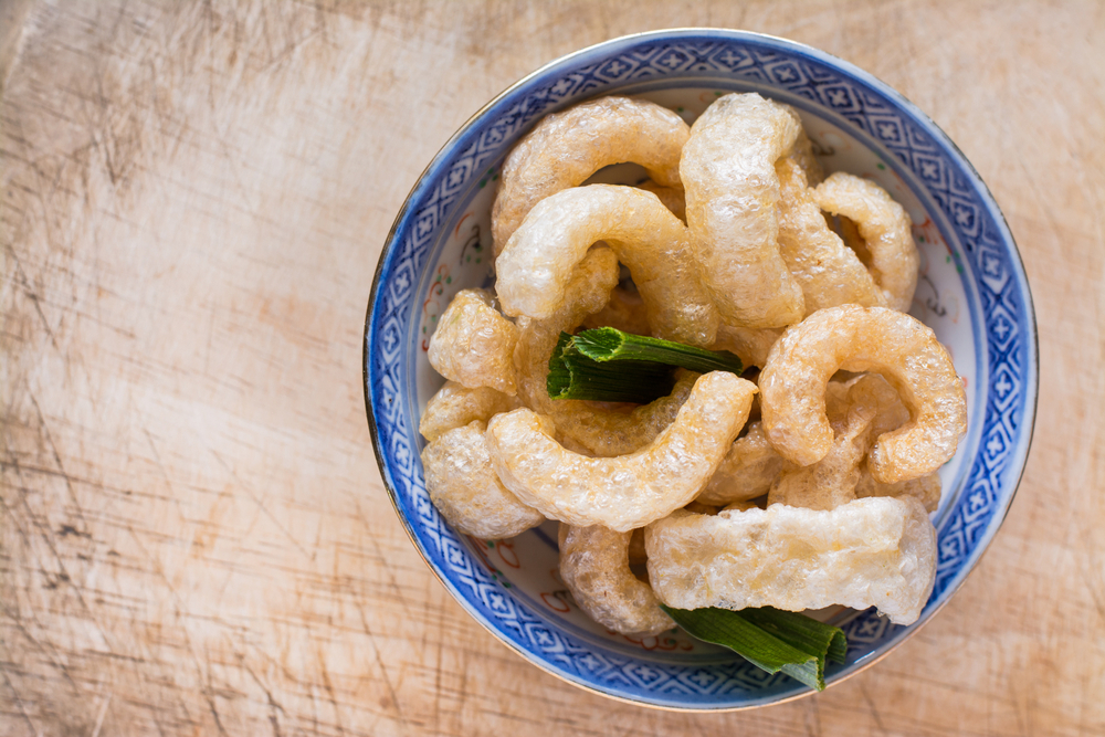 Bowl of fried pork rinds.
