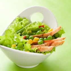 A lovely bowl of greens, mixed veggies, and Personal Trainer Food Fajita Chicken Strips.