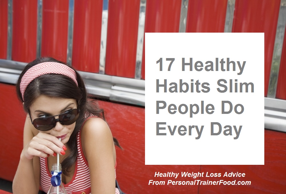 Young woman eating french fries potato with ketchup in a restaurant, having her lunch break. Close up