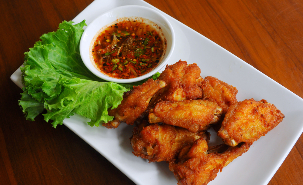 Personal Trainer Food burns fat with unlimited meats like Thai wings and fusion dipping sauce for your Super Bowl party.