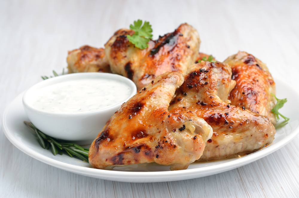 Personal Trainer Food burns fat with unlimited meats like Savory Herb Wings and Lemon Aioli Dipping Sauce for your Super Bowl party.