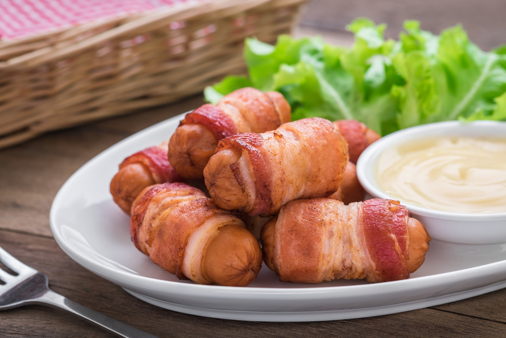 A yummy plate of bacon-wrapped smokies is a fun fat-burning snack. It's the Personal Trainer Food way!